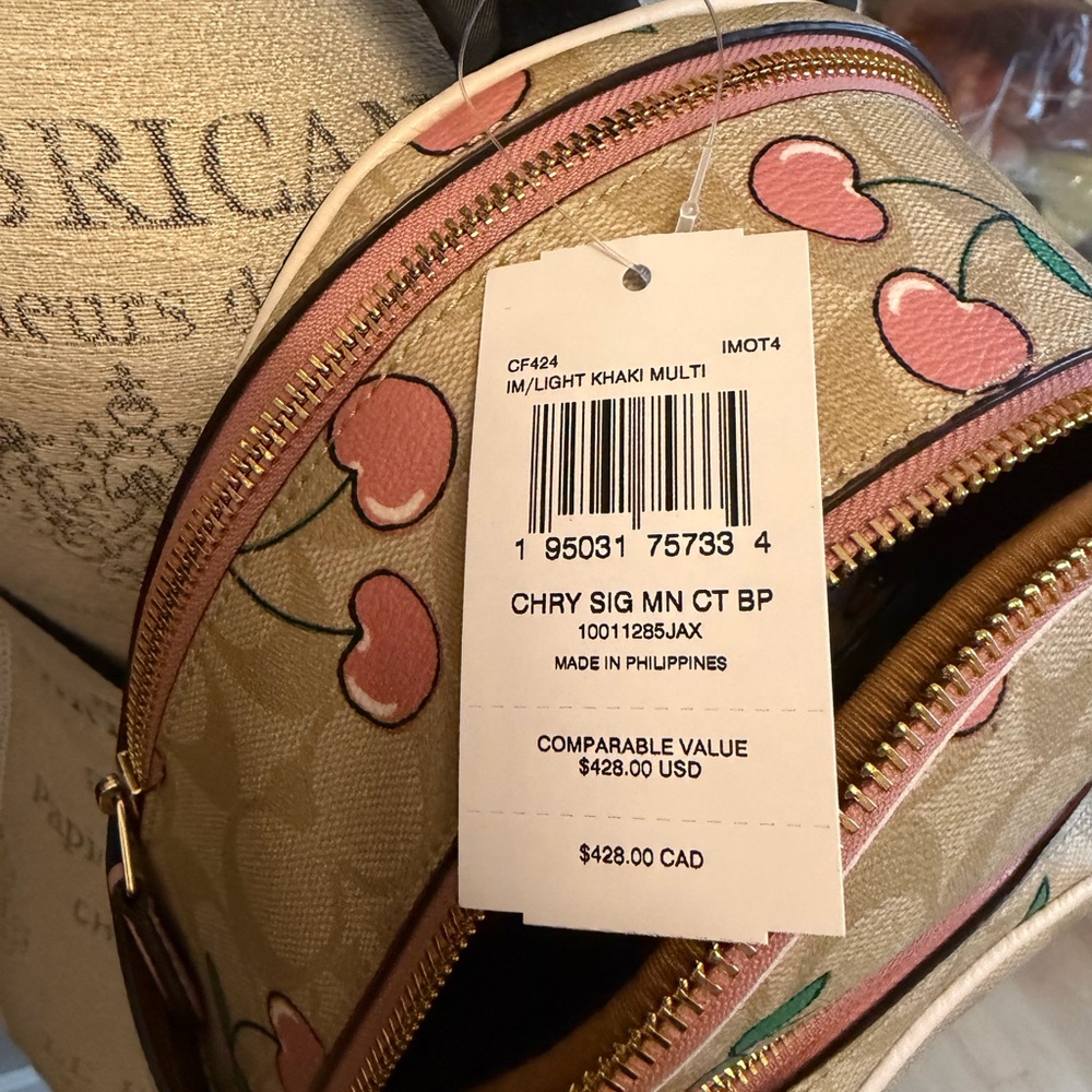 Coach Light Khaki Mini Backpack with Pink Cherry Print - Picture 2 of 3